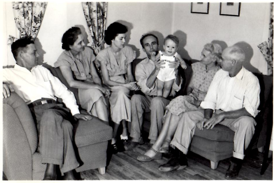 When I was 1, with my parents and grandparents. Kinder people and perhaps better times